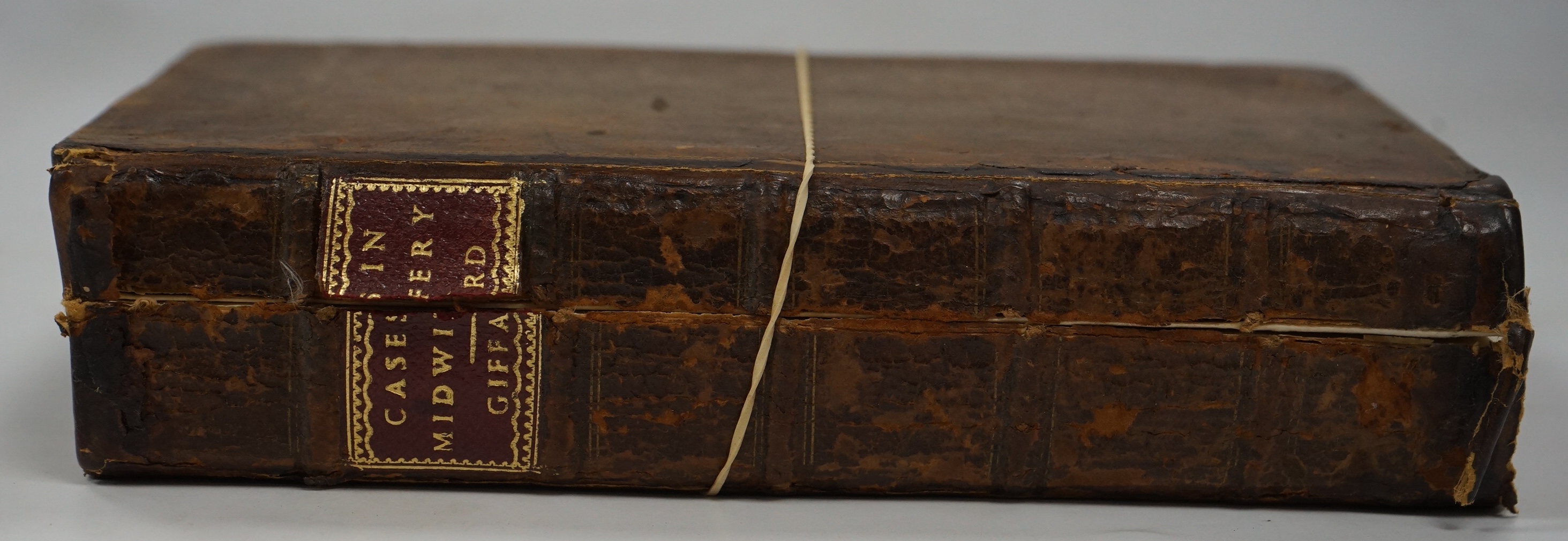 Giffard, William - Cases in Midwifery ... revised and published by Edward Hody ... 3 folded plates, half and title page decorations; contemp. gilt ruled calf, panelled spine with red label (distressed). 1734